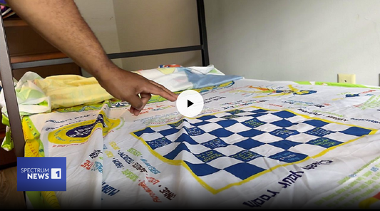 Kevin Gatlin explains the meaning behind his interactive bedsheets and how they help struggling kids. (Spectrum News 1)